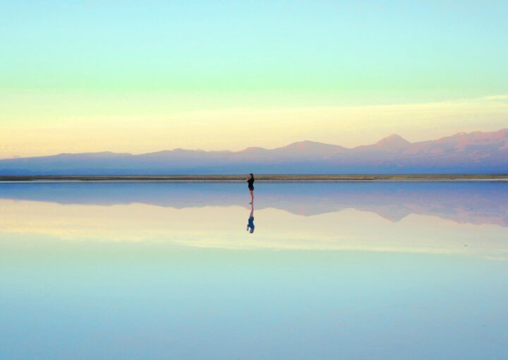 person standing near body of water during daytime