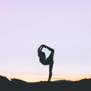 woman standing with her one leg