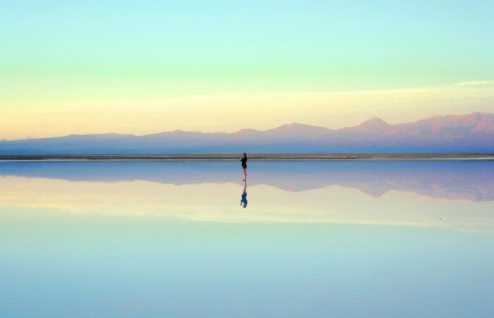 person standing near body of water during daytime