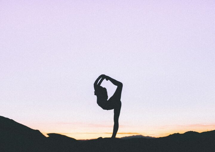 woman standing with her one leg