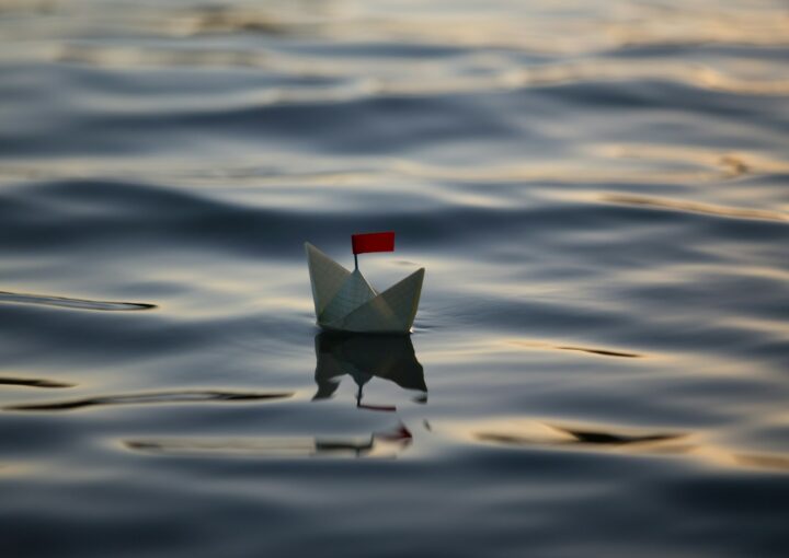 closeup photo of white paper boat