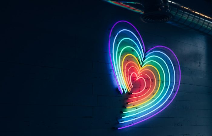 multicolored heart LED light on wall
