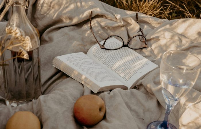 black framed eyeglasses on white book page