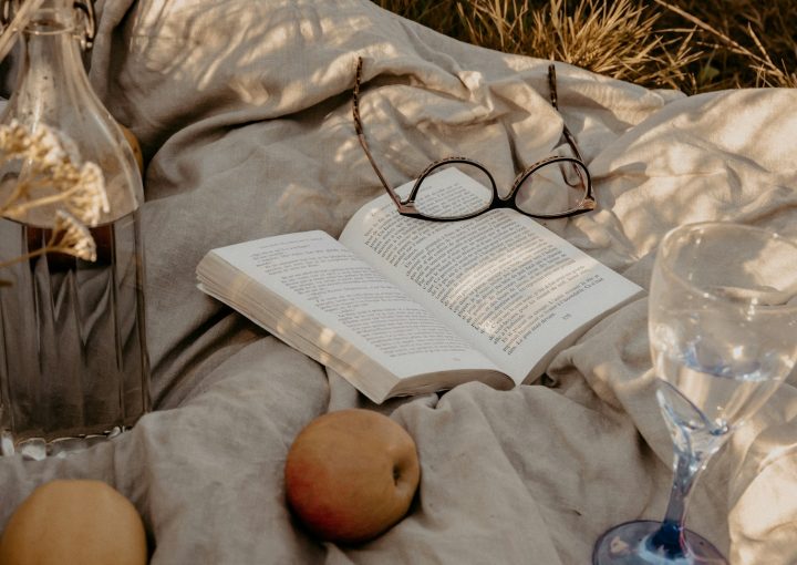black framed eyeglasses on white book page
