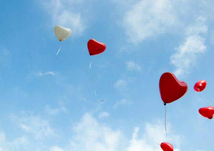 red and white heart balloons