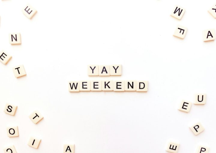 scrabble letters spelling out the word yay weekend