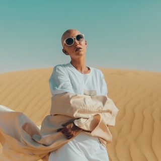 person standing on desert during daytime