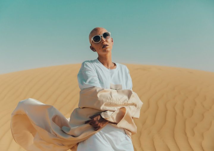 person standing on desert during daytime