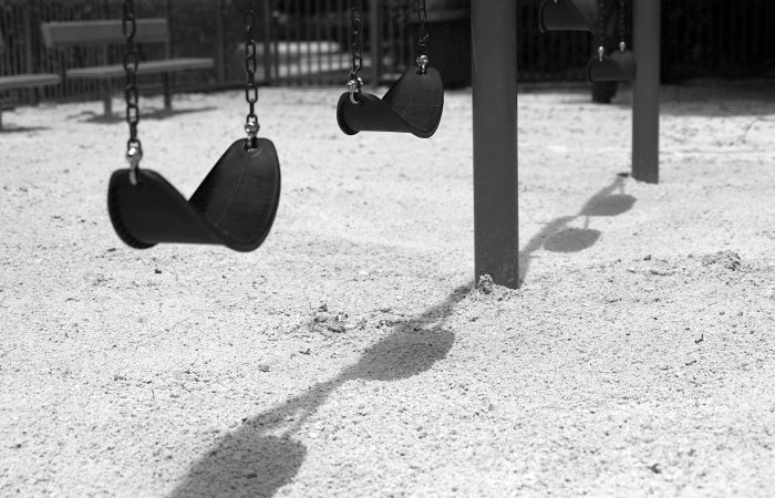 a swing set in a playground